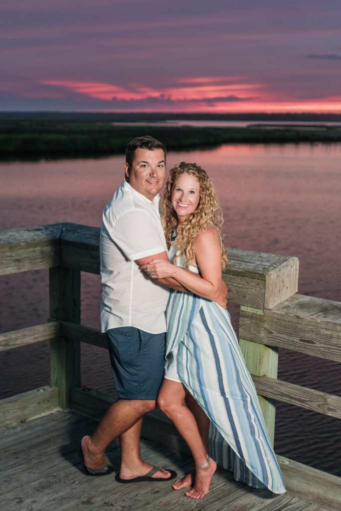 couple at sunset on dock Topsail Beach NC
