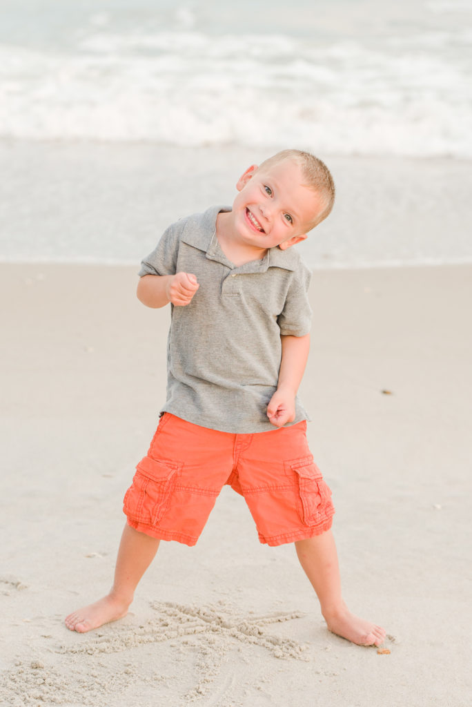 boy playing on beach