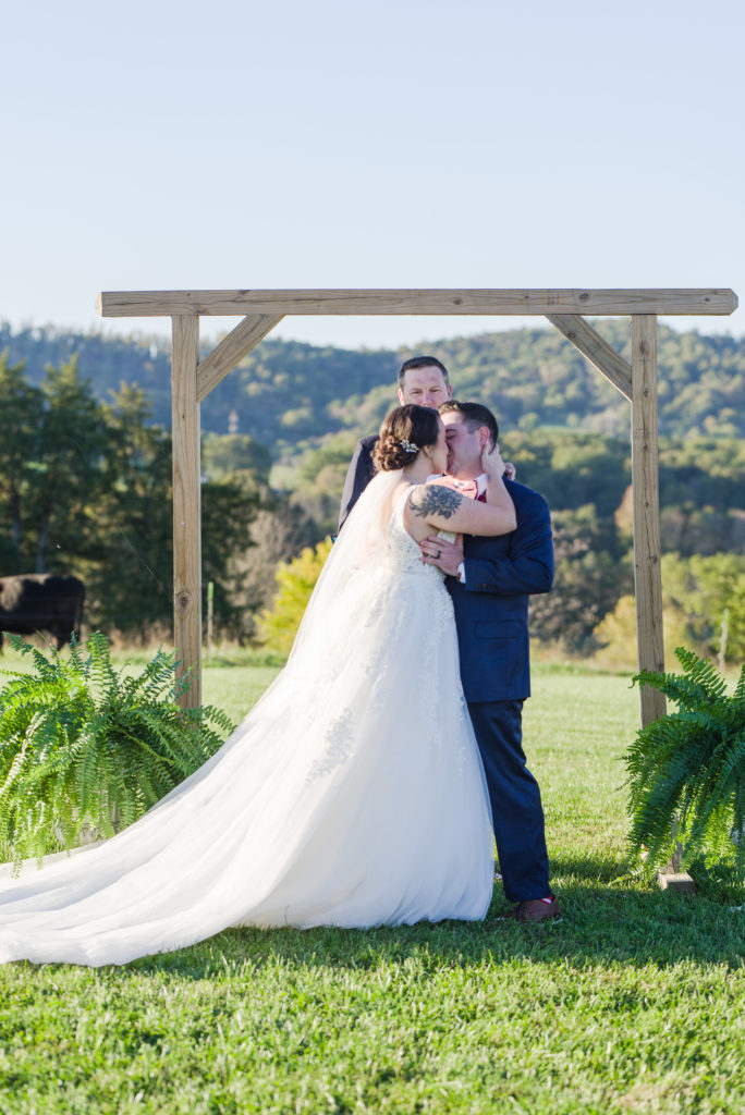 bride and groom kissing