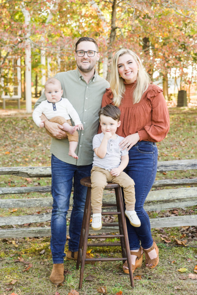 family portrait with small children in fall foliage