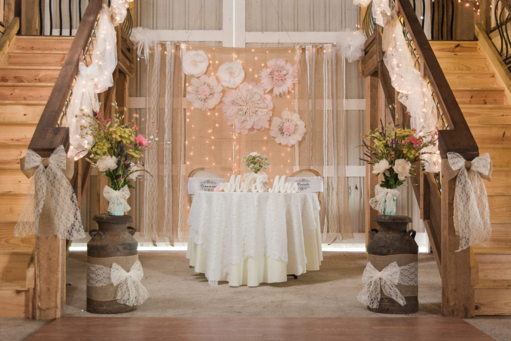 photo of sweetheart table at wedding reception