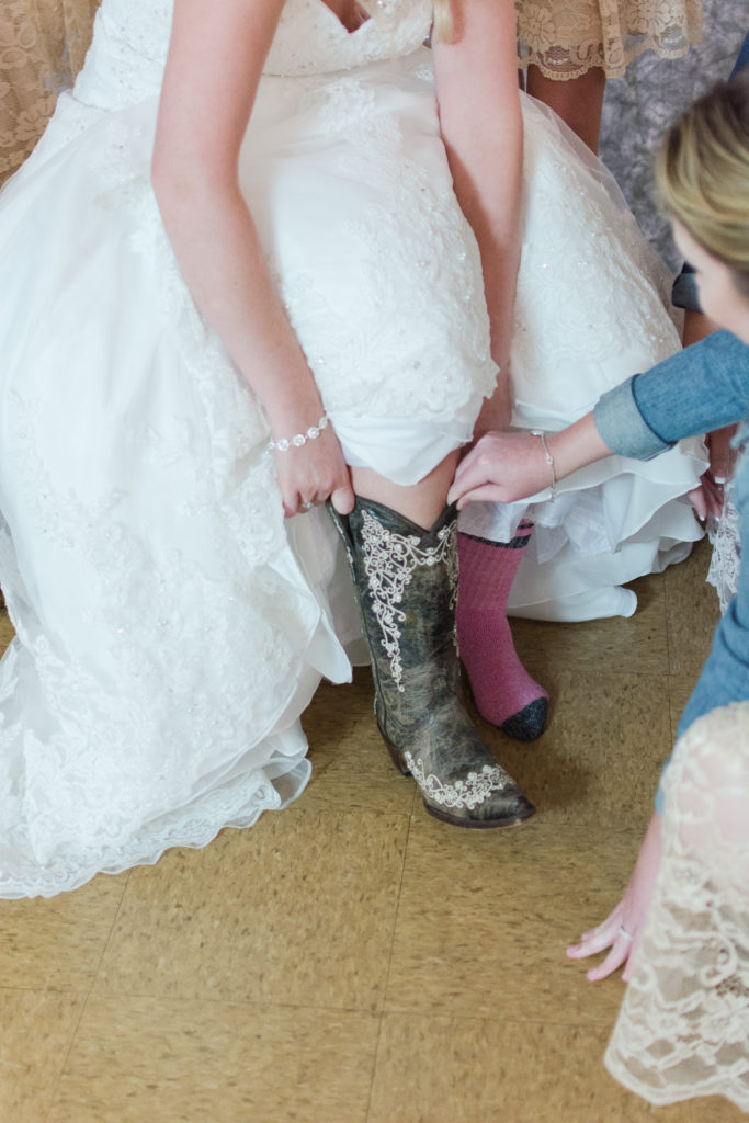 bride putting on her boots