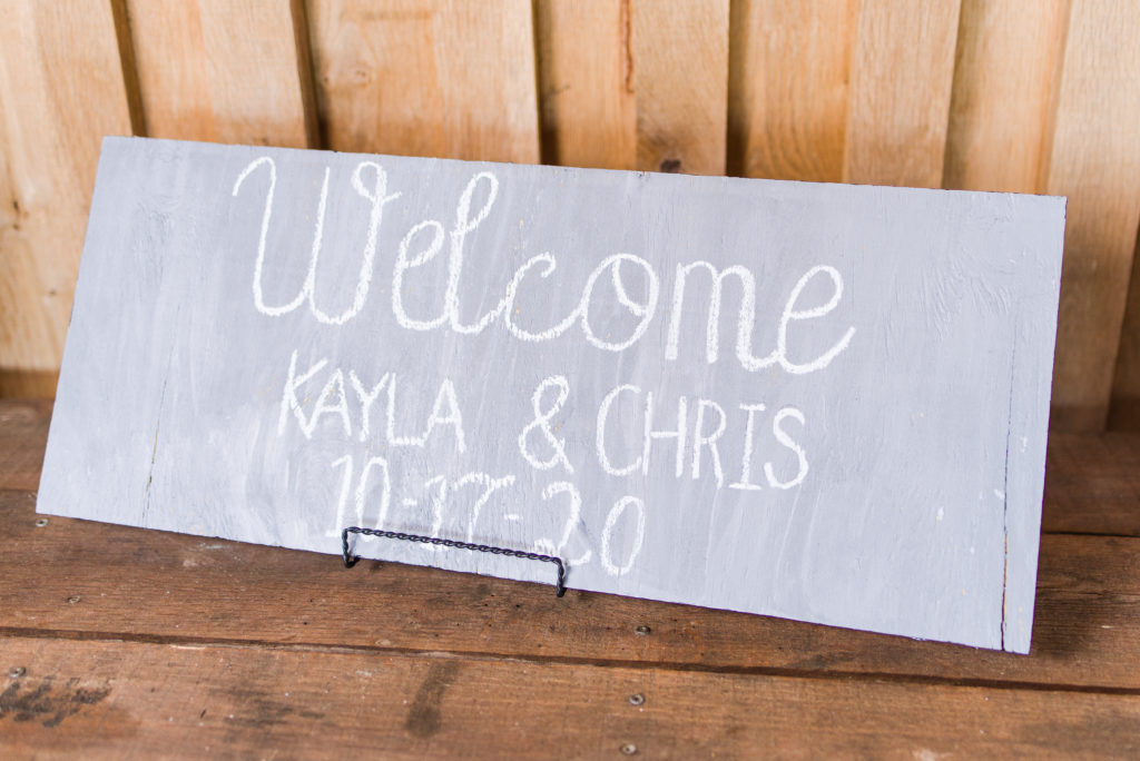 painted wooden sign for rustic wedding ideas