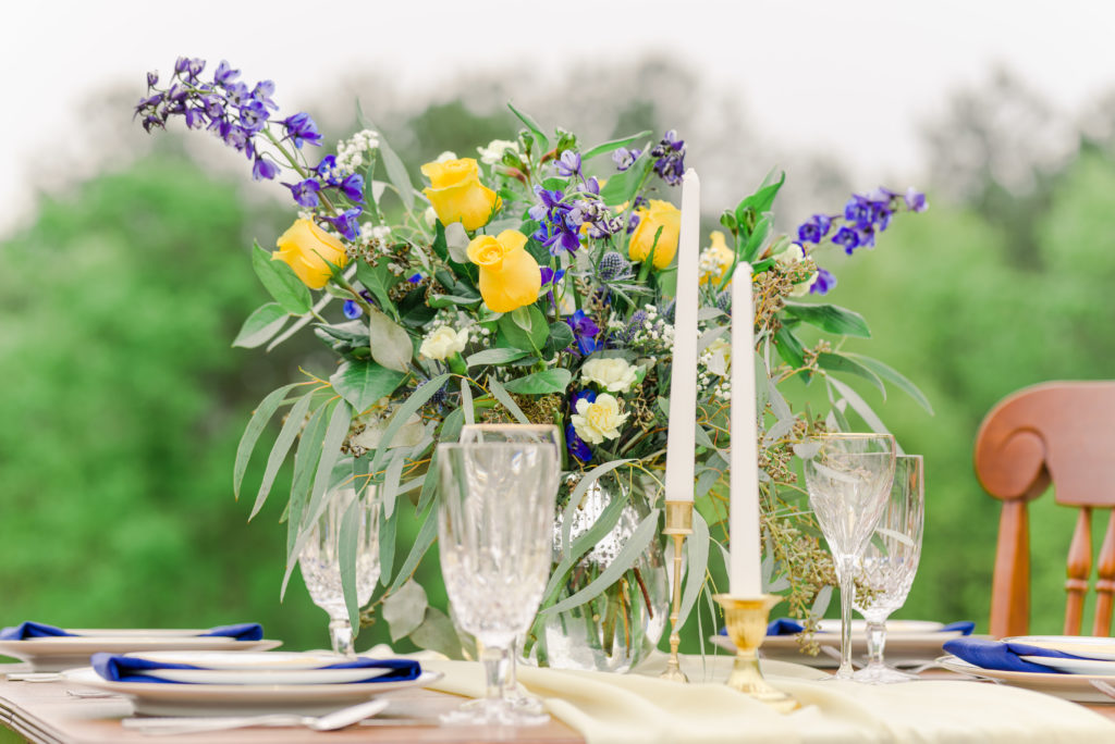 blue and yellow floral arrangement for reception table