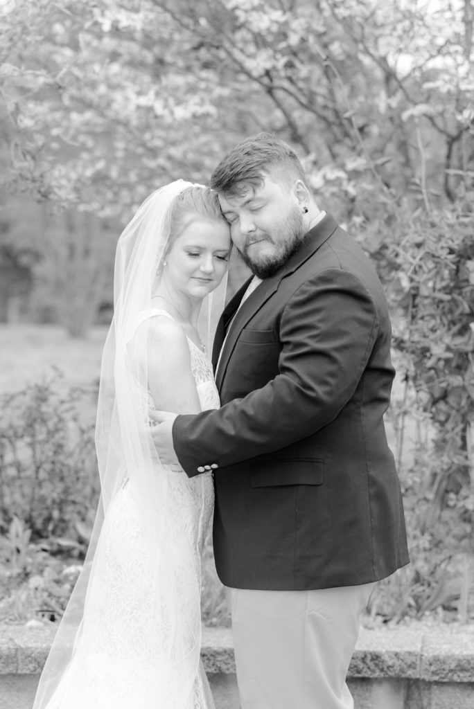 bride and groom embracing for styled shoot