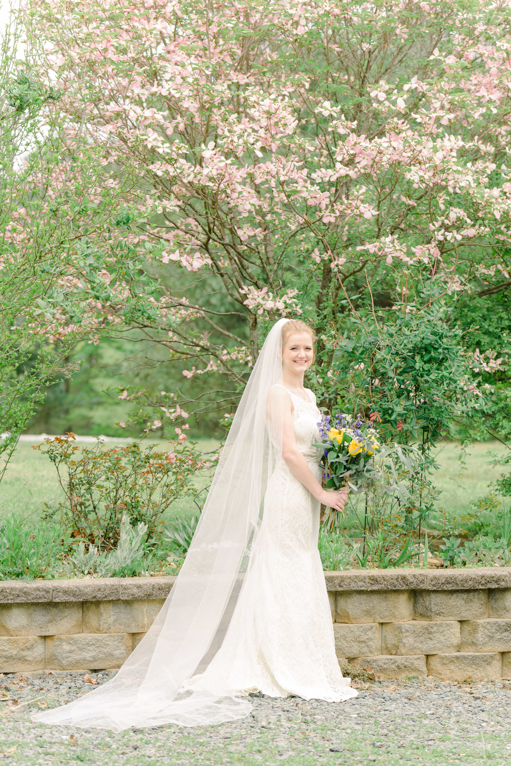 bridal portrait with dogwood in background