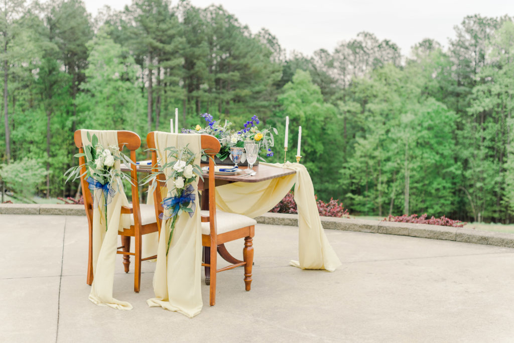 sweetheart table for styled shoot in front of open field