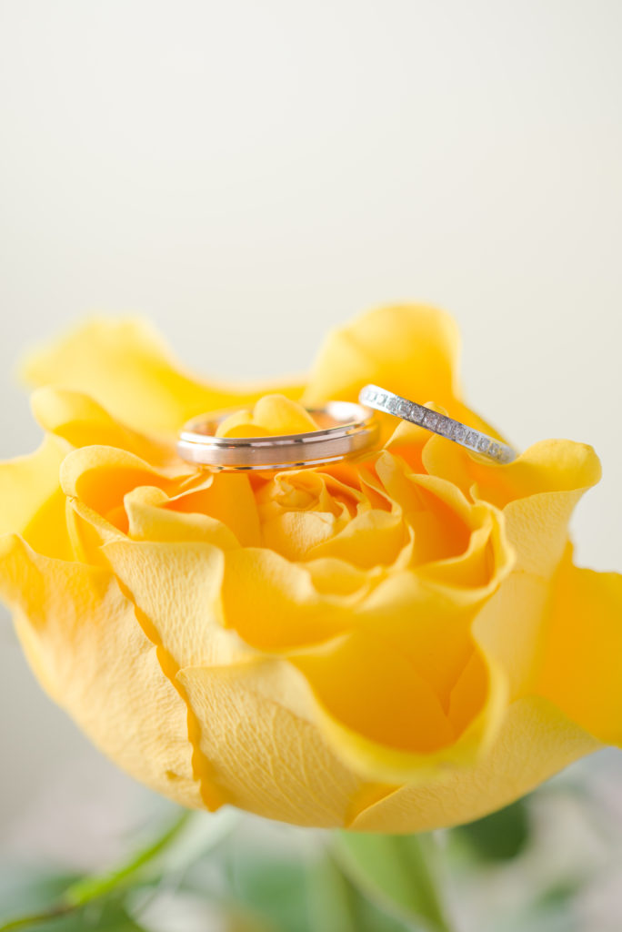 wedding rings in yellow rose