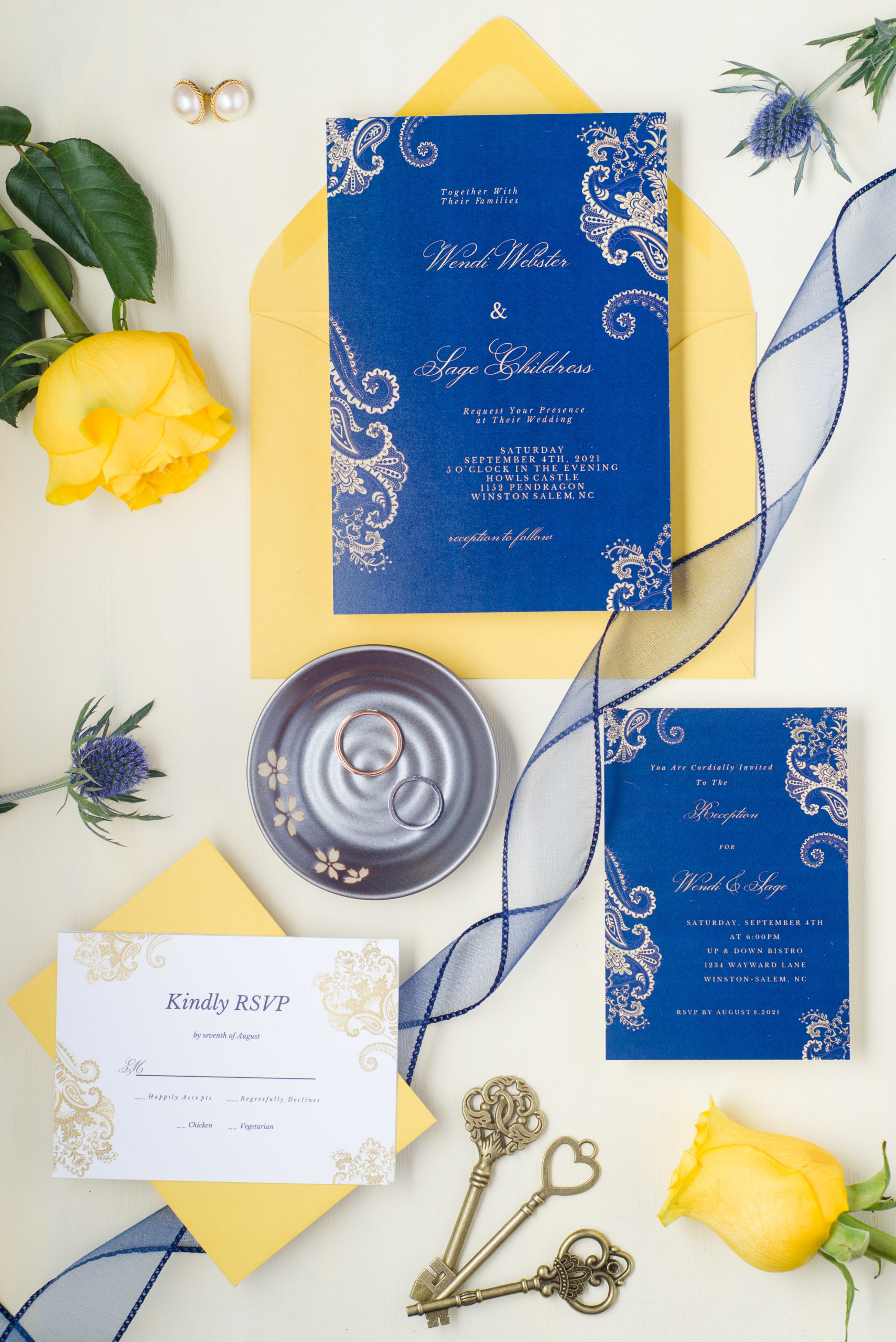 flat lay with wedding invitation suite
