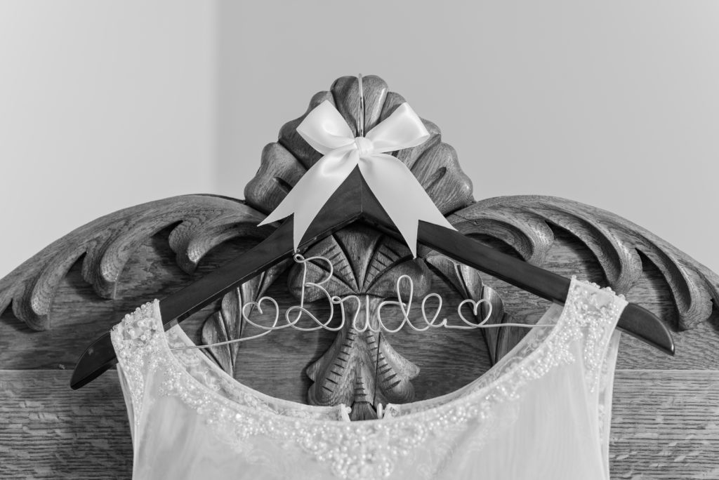 wedding dress on bride hanger