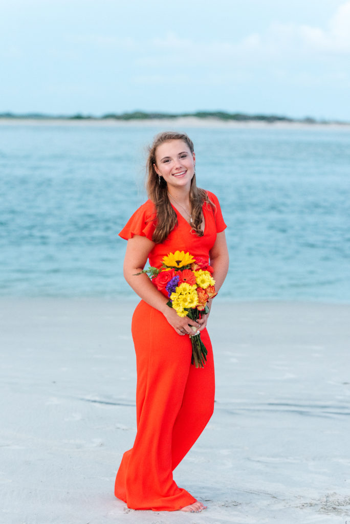 sweet sixteen portrait with bouquet on the beach at North Topsail, North Carolina