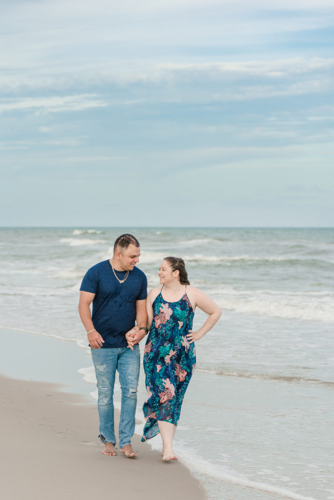 couple walking on Topsail Beach, NC