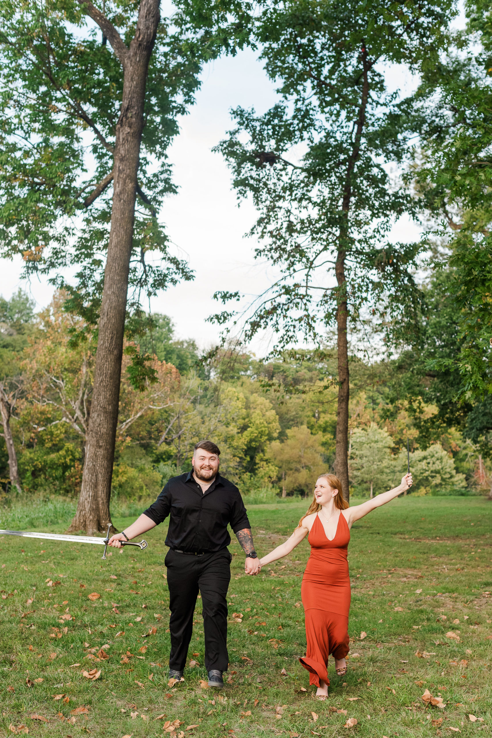engaged couple running at Wasabi Park Roanoke Virginia