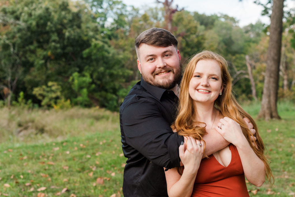 couple smiling during engagement session