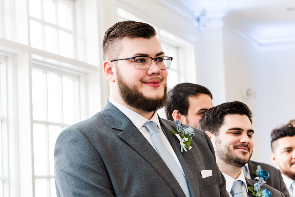 groom's reaction to bride walking down the aisle