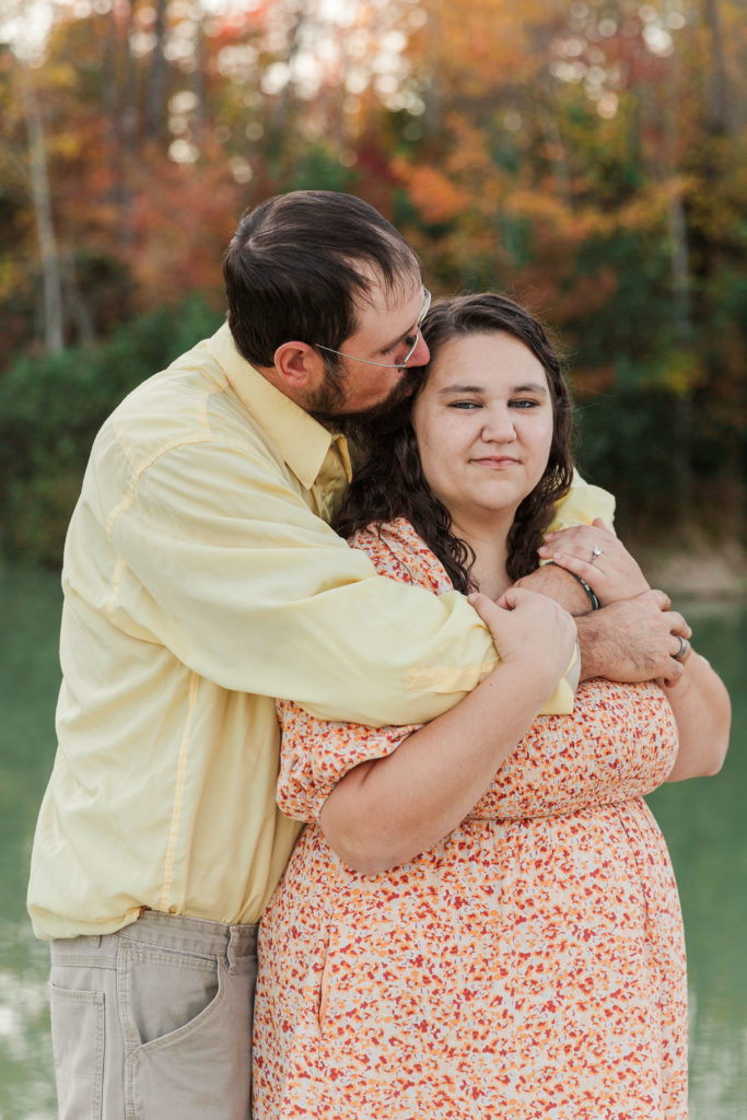 groom to be hugging bride to be