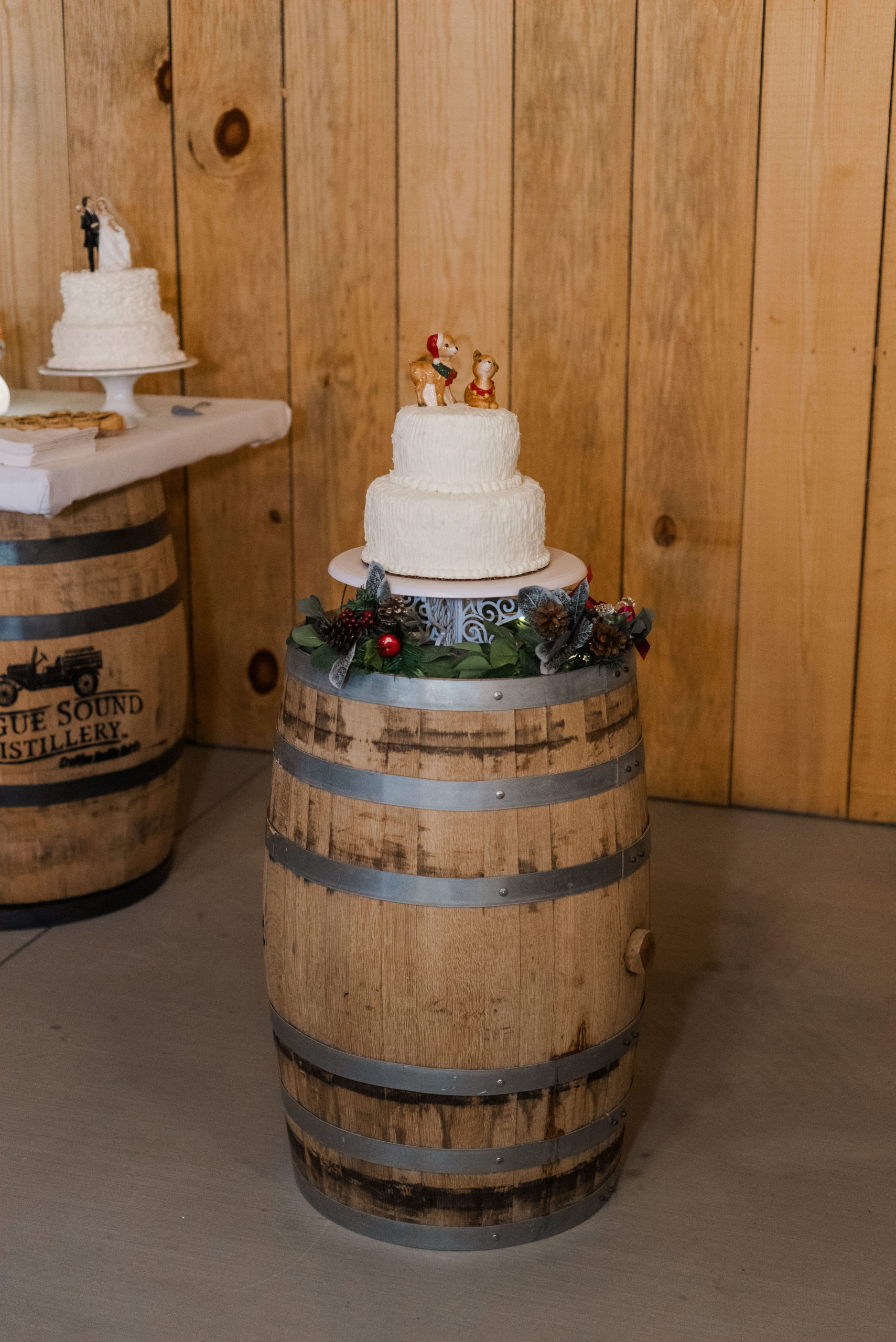 wedding cake with reindeer cake topper Wright Memorial Event Center
