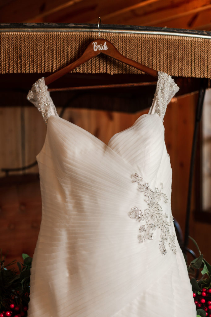wedding dress hanging from carriage