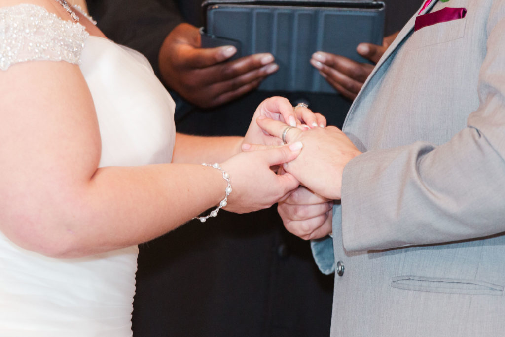 ceremony- exchanging rings - Wright Memorial Event Center