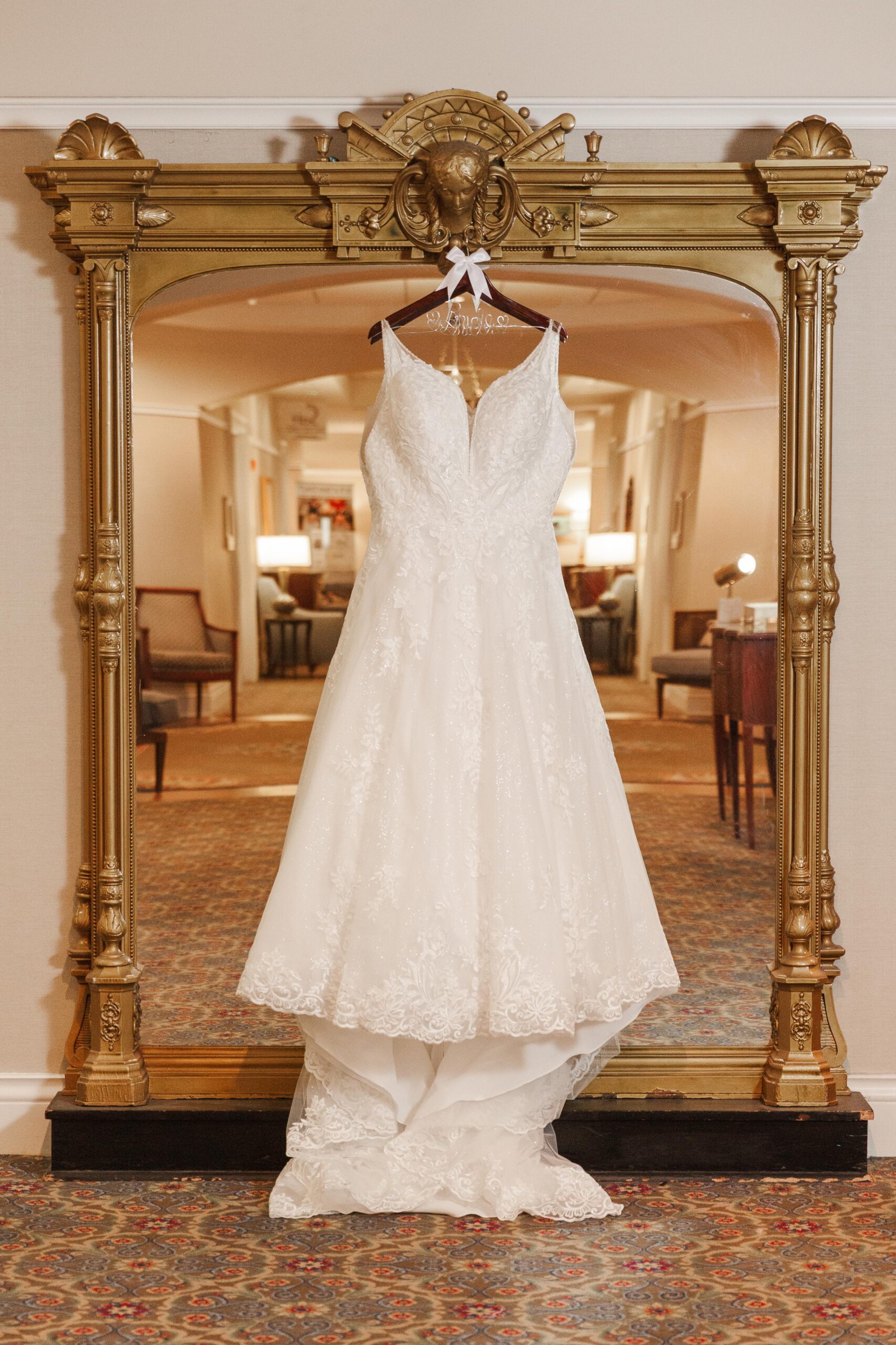 wedding dress hanging on mirror at The Hotel Roanoke