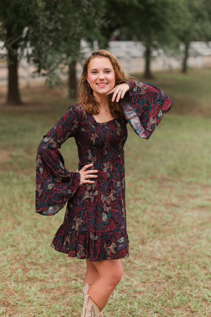 senior portraits, Fulshear, Texas with bouquet and cowboy boots