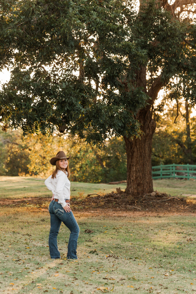 Senior portraits with cowboy hat and boots