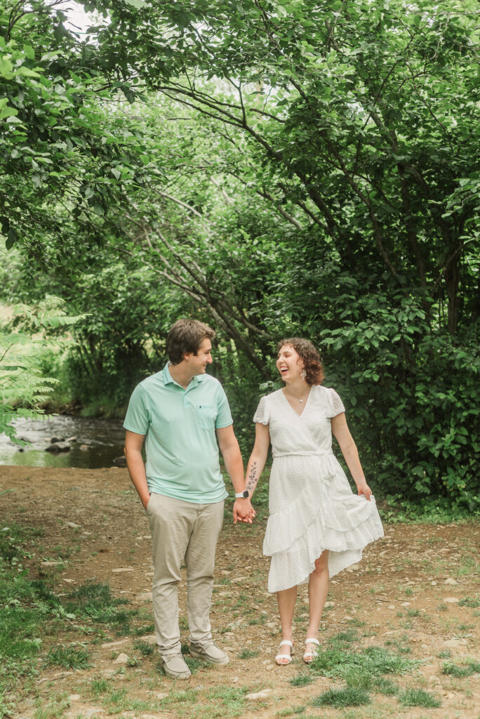 couple walking during Engagement Session at Bold Rock Hard Cider, Nellysford, Virginia