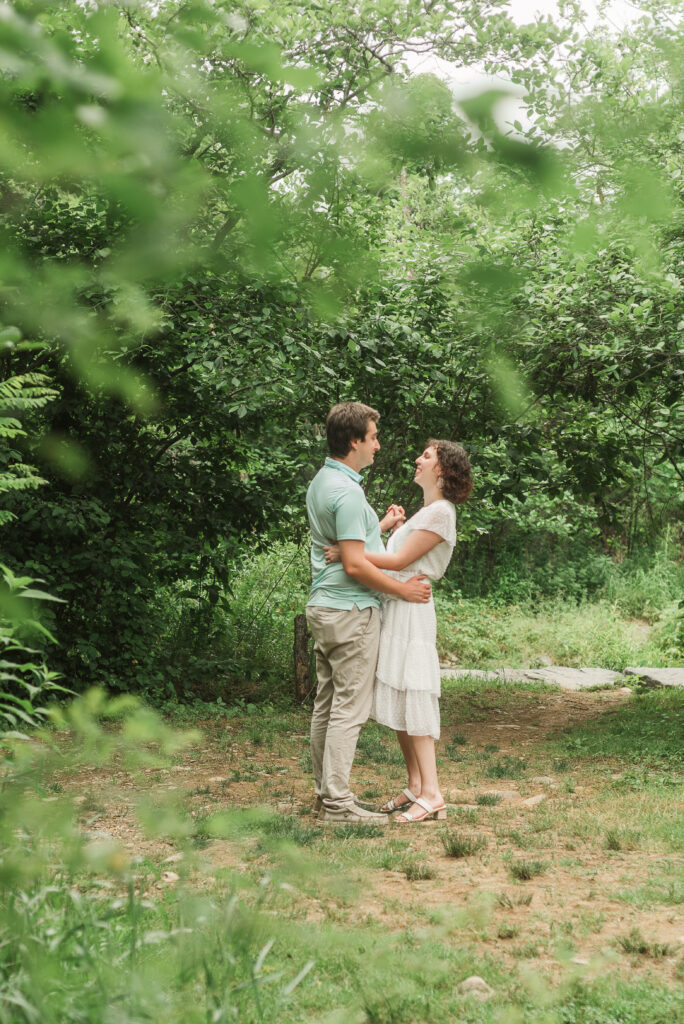 Couple Dancing during Engagement Session at Bold Rock Hard Cider, Nellysford, Virginia