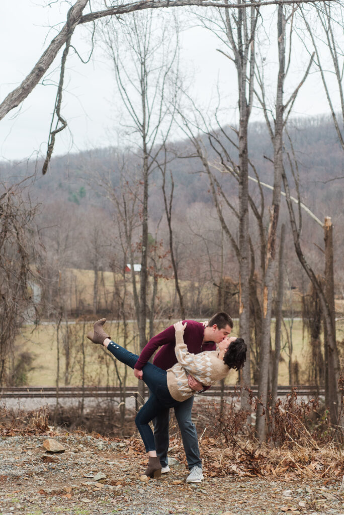 couple during winter engagement session at Potter's Craft Cider