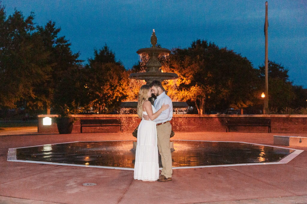 couple in front of the fountain