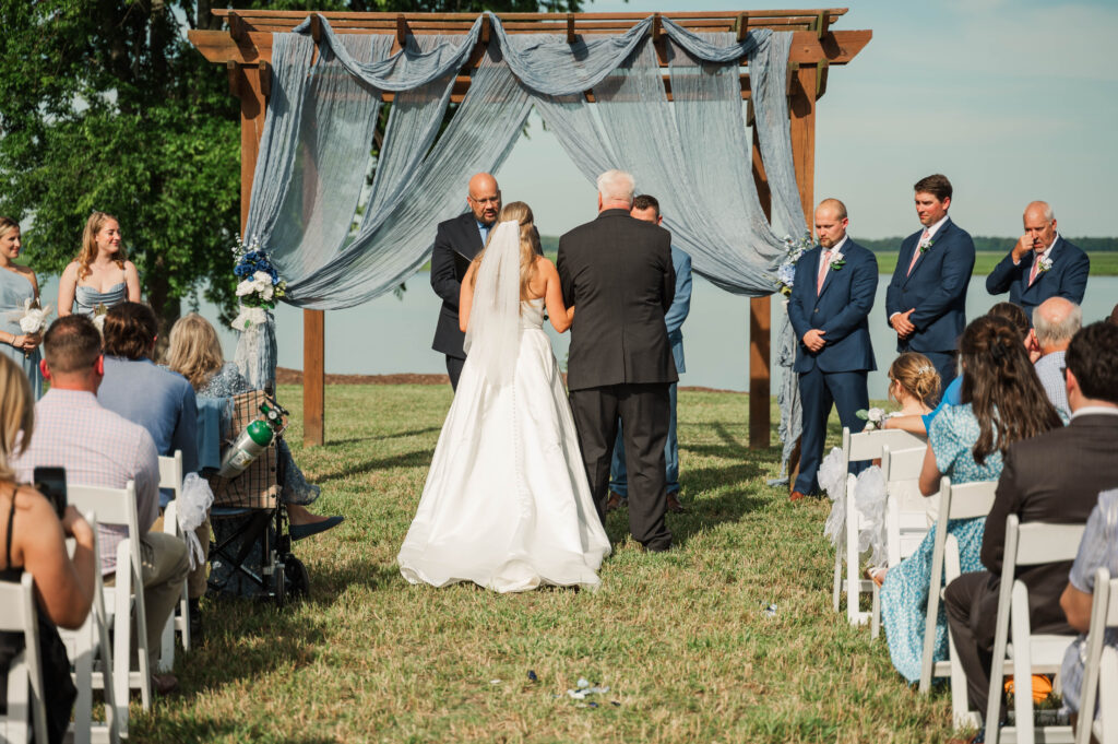 bride being given away by dad