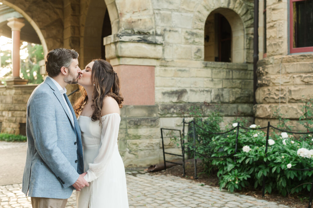 couple kissing during engagement session at Mansion, Maymont, Richmond, Virginia