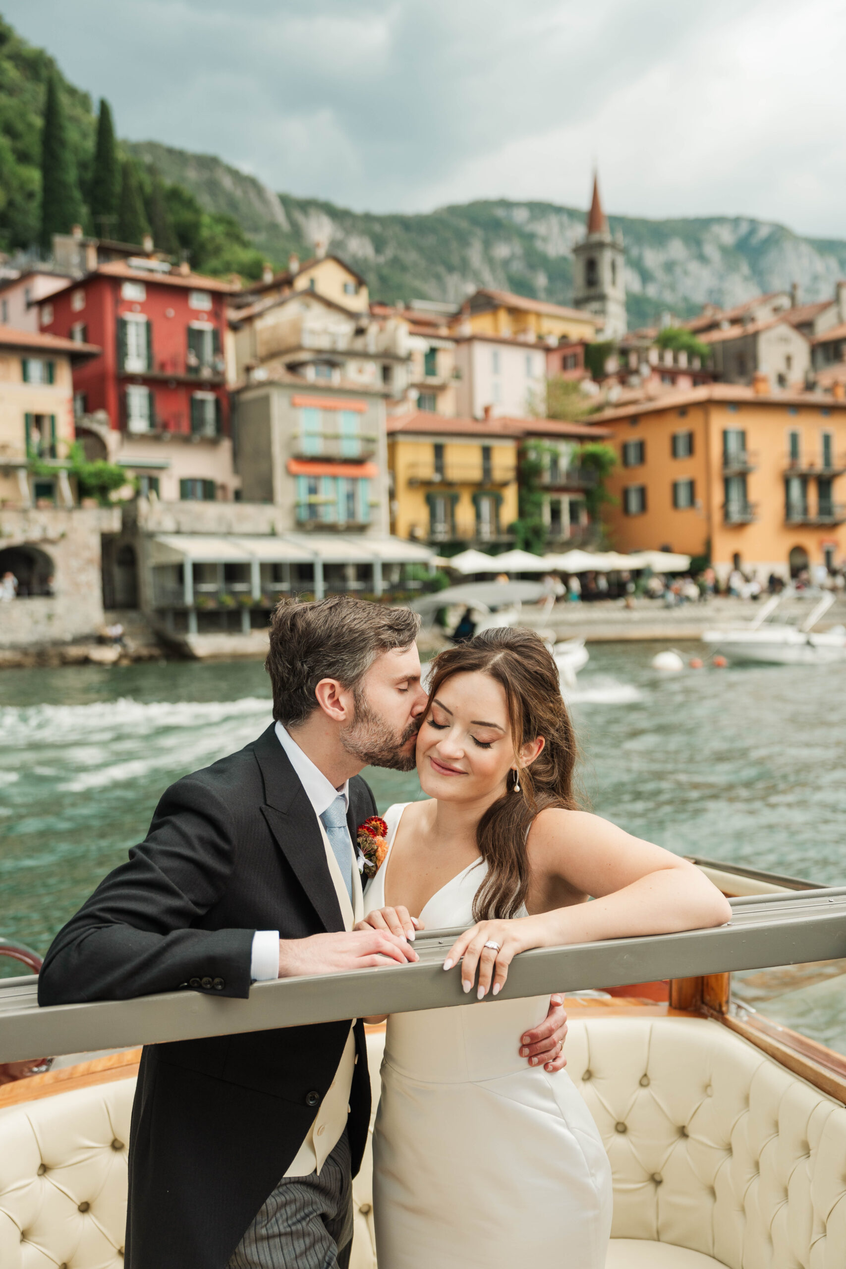 bride and groom portraits on boat, Lake Como, Italy