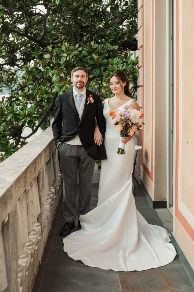 bride and groom portraits on balcony at Hotel Villa Cipressi, Lake Como, Italy