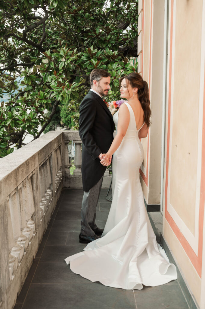 bride and groom portraits on balcony, Lake Como, Italy