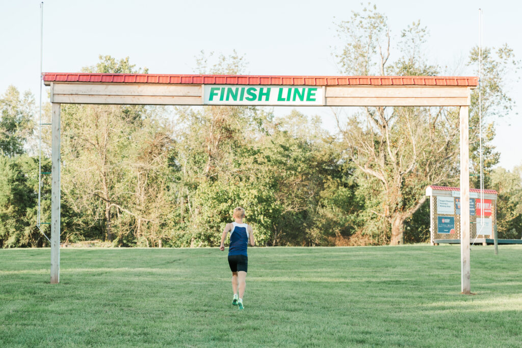 JT running across the finish line at Panorama Farms