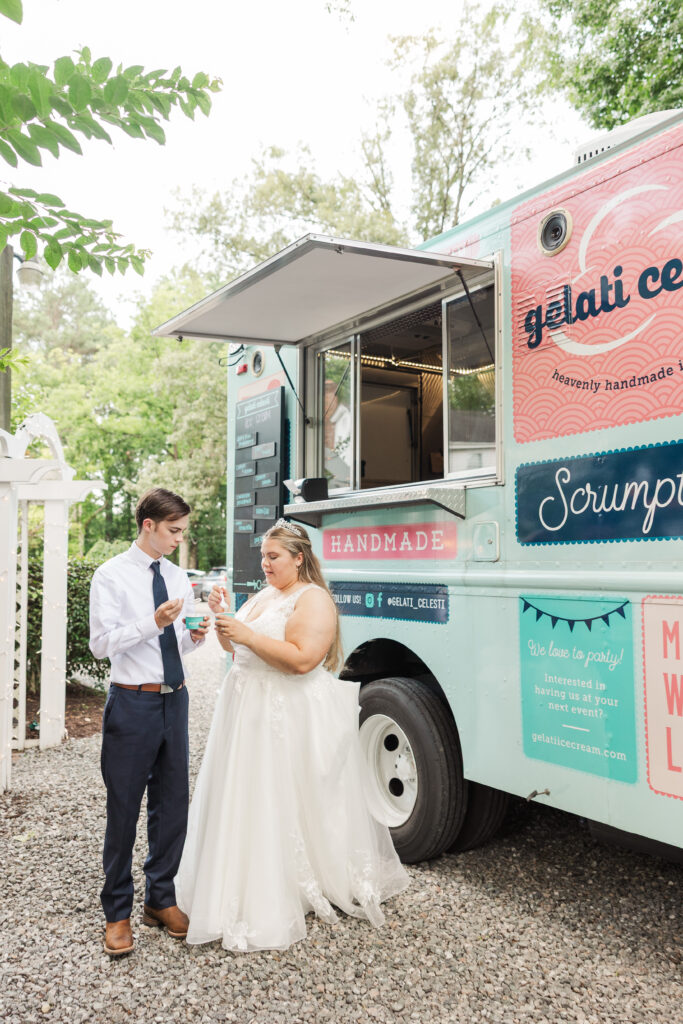 bride and groom at ice cream truck for wedding dessert