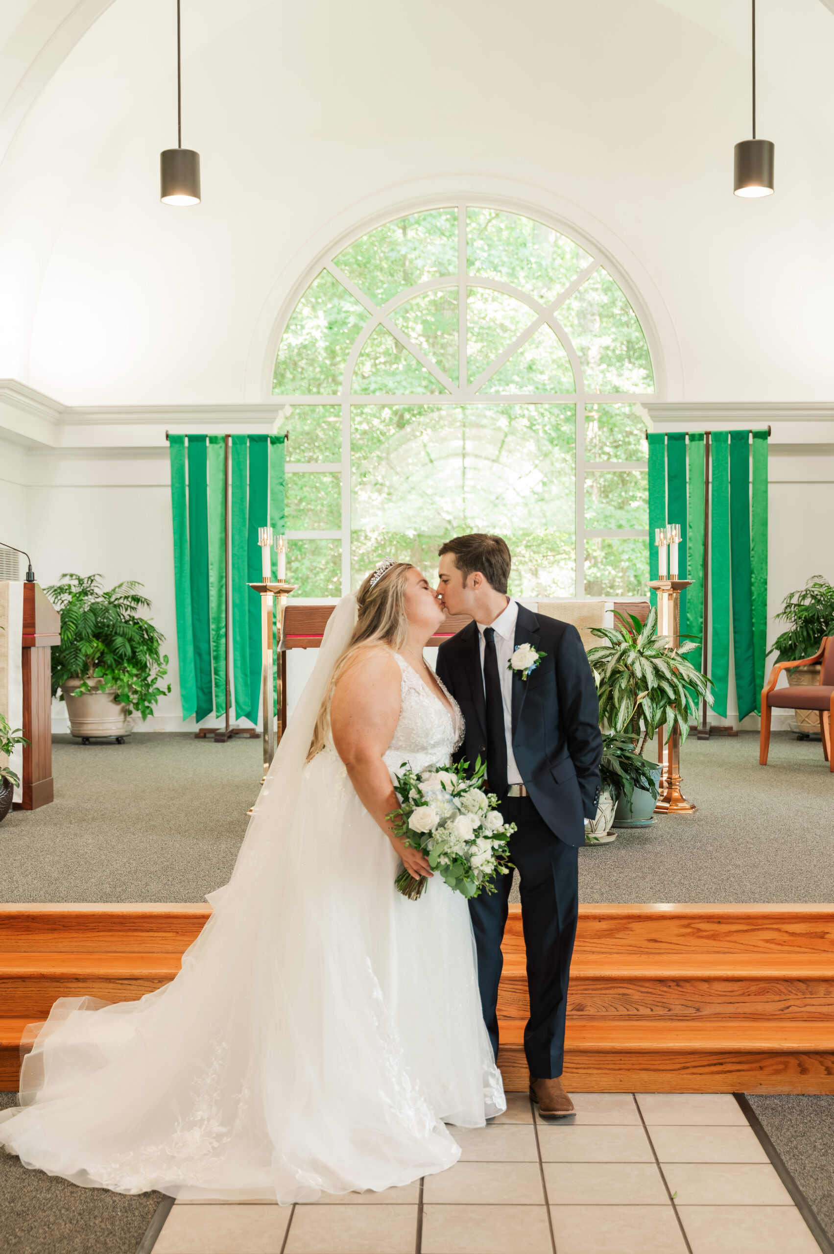 bride & groom in catholic church