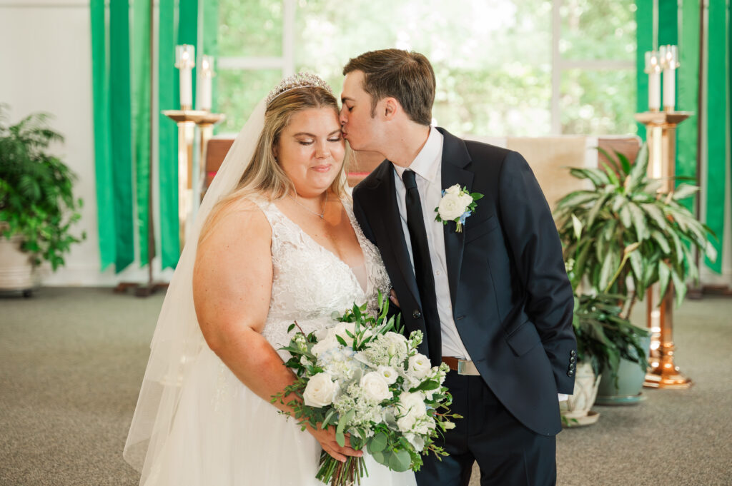 bride & groom in catholic church