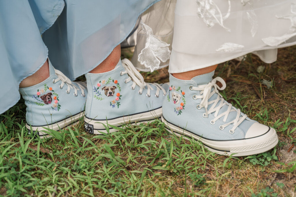 converse with dog embroidered on each shoe