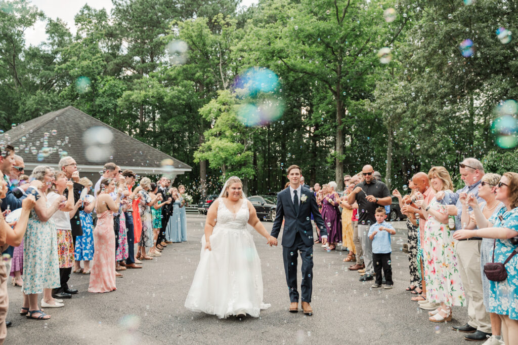 bride and groom during bubble entrance