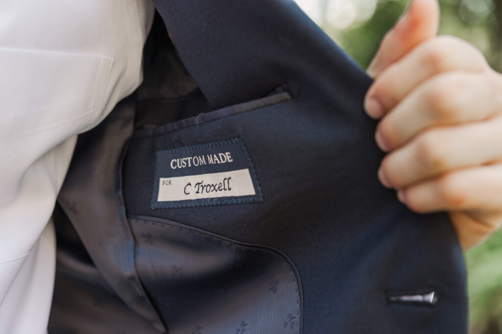 label on groom's custom made suit