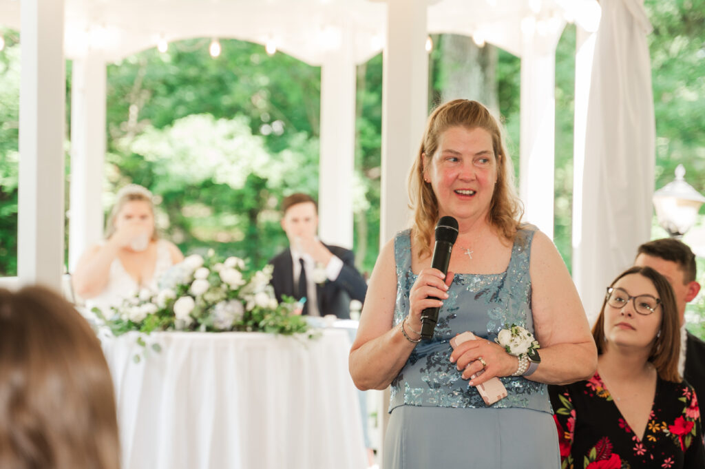reception welcome by Mother of the bride