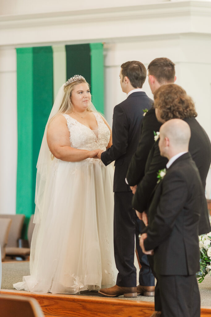 bride and groom exchanging vows