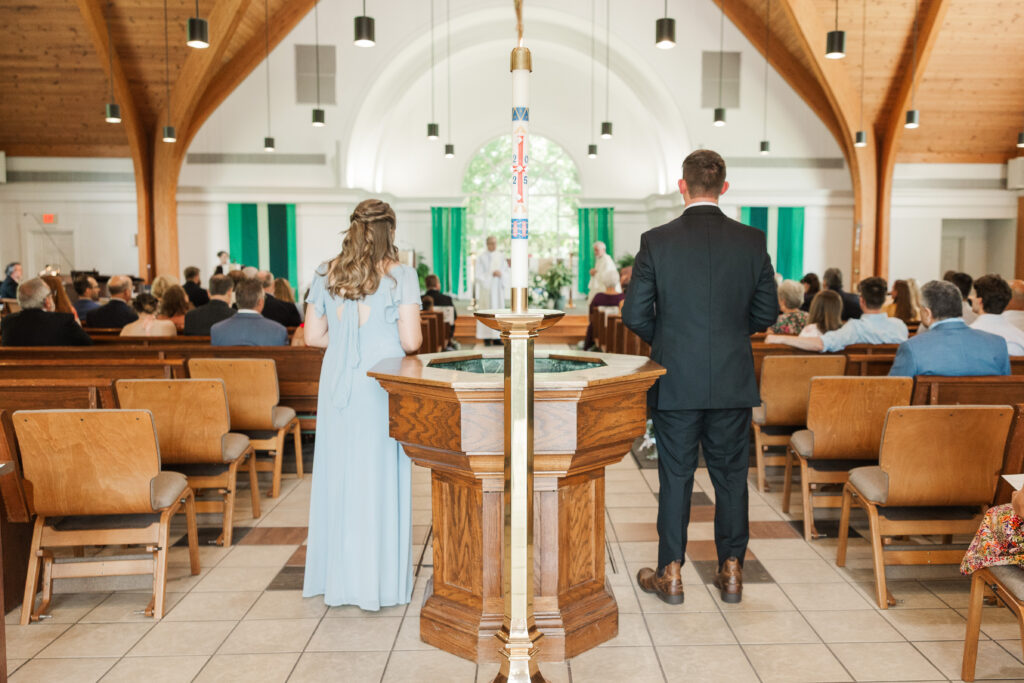 wedding attendants bringing in eucharist