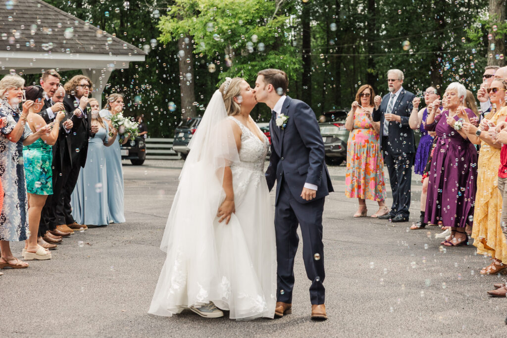 bride and groom during bubble entrance