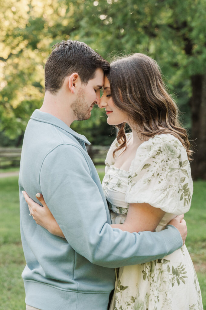couple embracing for engagement photos
