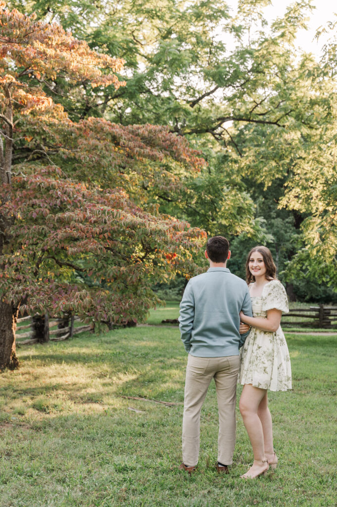 fall foliage during couple's engagement session