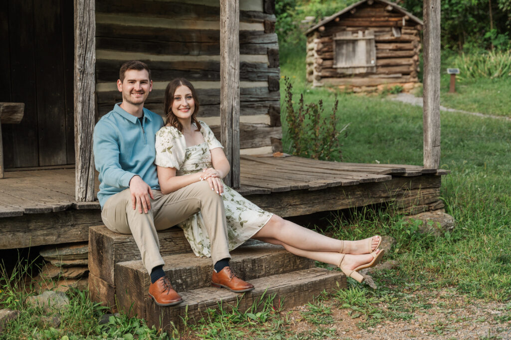 couple sitting on porch at Humpback Rocks Visitor Center