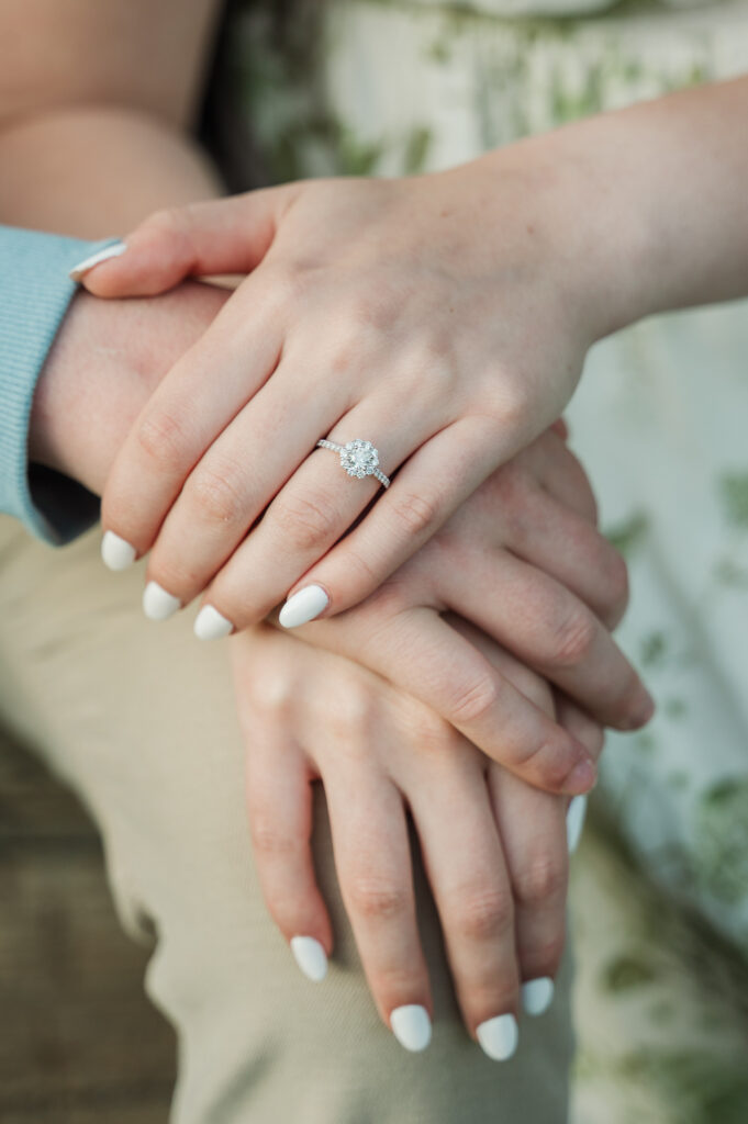engagement ring on finger of bride to be